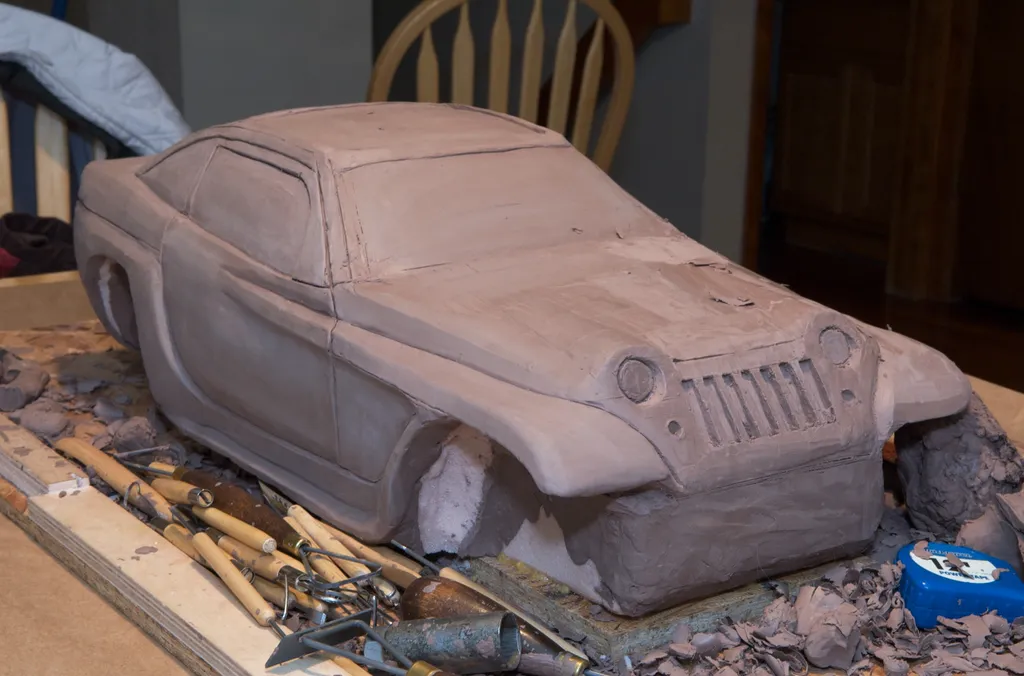 Front three-quarter view of the Jeepster model showing the grille and headlight details