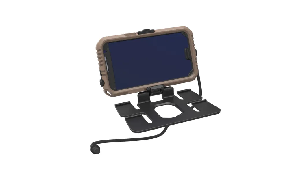 Rendering of a tan rugged phone case on a black folding mount plate, with a cable running from the case